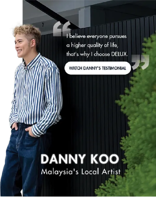 Malaysian artist Danny Koo beside his DELUX door