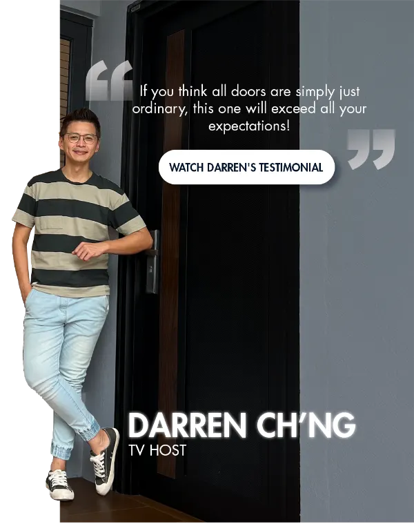 TV host Darren Ch'ng leaning on his DELUX door